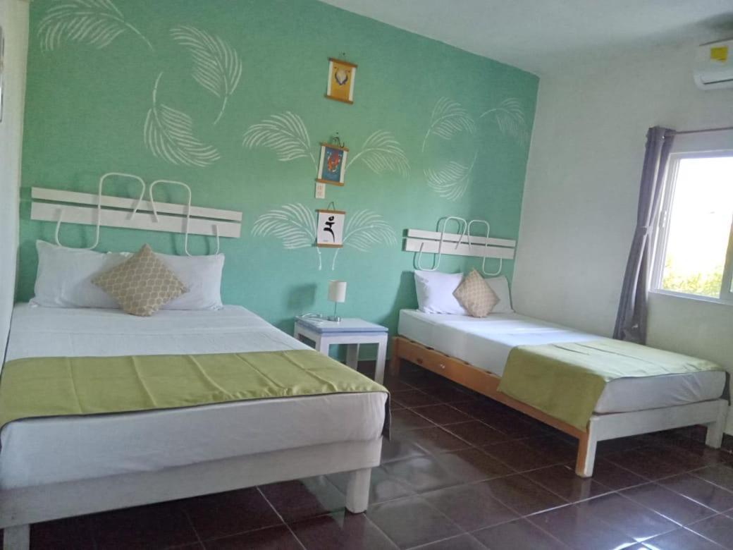 Departamentos Cerca De Ferry Holbox Hotel Екстериор снимка